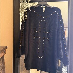 Stylish Black Sweater with Gold Accents